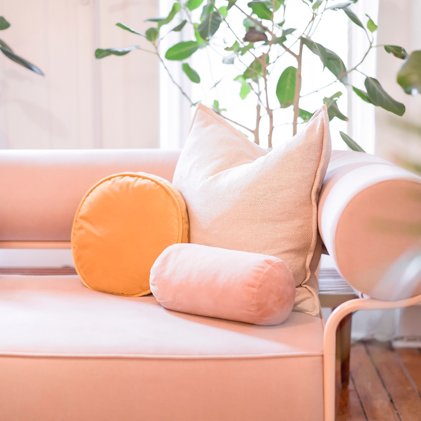 colorful pink and orange pillows to add color to your home